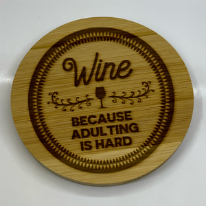 Sip, Savor & Smile: The Witty Engraved Wooden Wine Coaster Collection